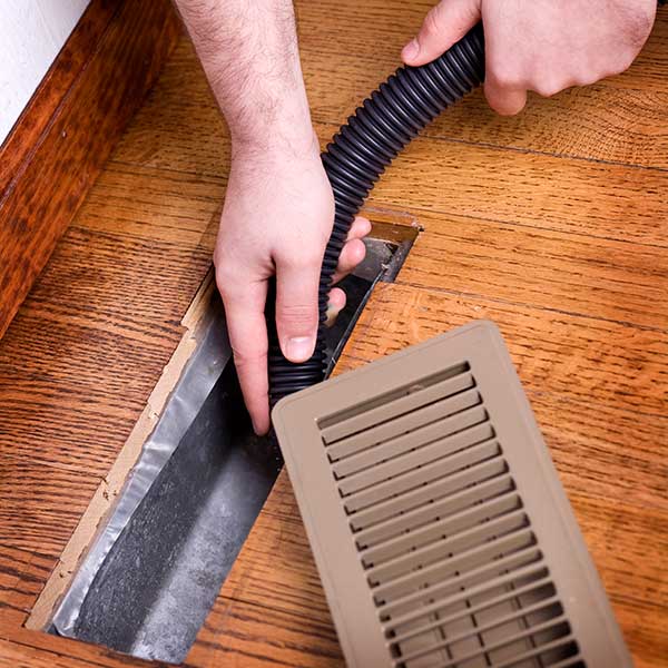 Heating Vent Air Duct Getting Cleaned